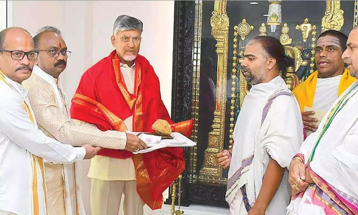 Andhra Pradesh Chief Minister N. Chandrababu Naidu with Executive Officer of TTD J Syamala Rao during a meeting. Rao invited Naidu to attend the Tirumala Srivari Brahmotsavams