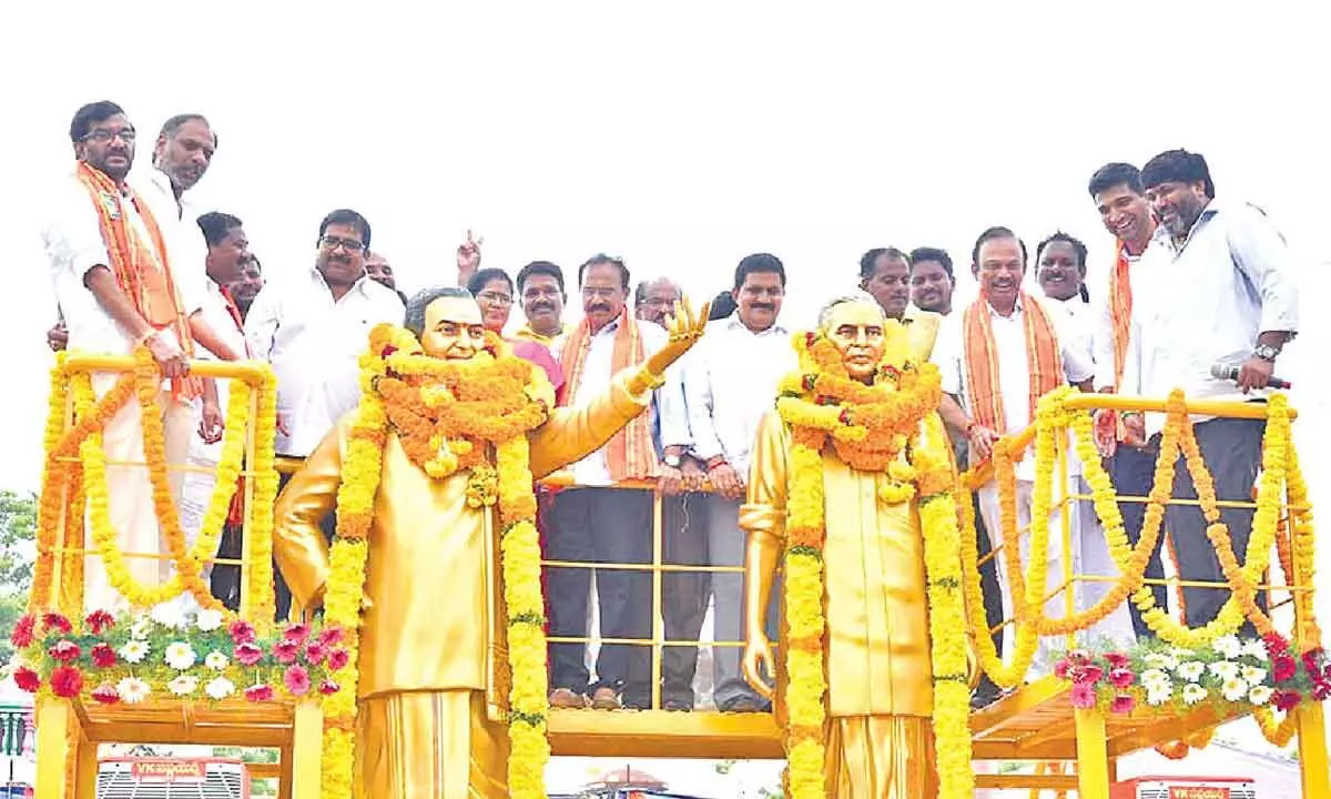 Ministers, MLAs and other TDP leaders after inaugurating the statues of NT Ramarao and Damacharla Anjaneyulu at Mallavarappadu on Sunday