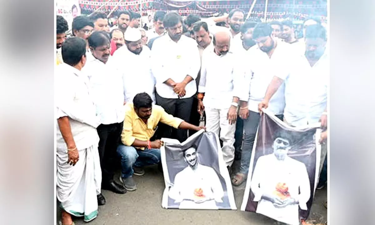 TDP leaders set fire to Jagan’s flexi