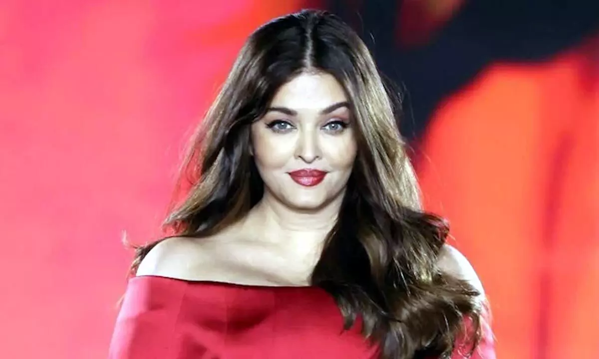 Aishwarya Rai Bachchan’s Red Veil Triumph at L'Oréal Paris Fashion Week