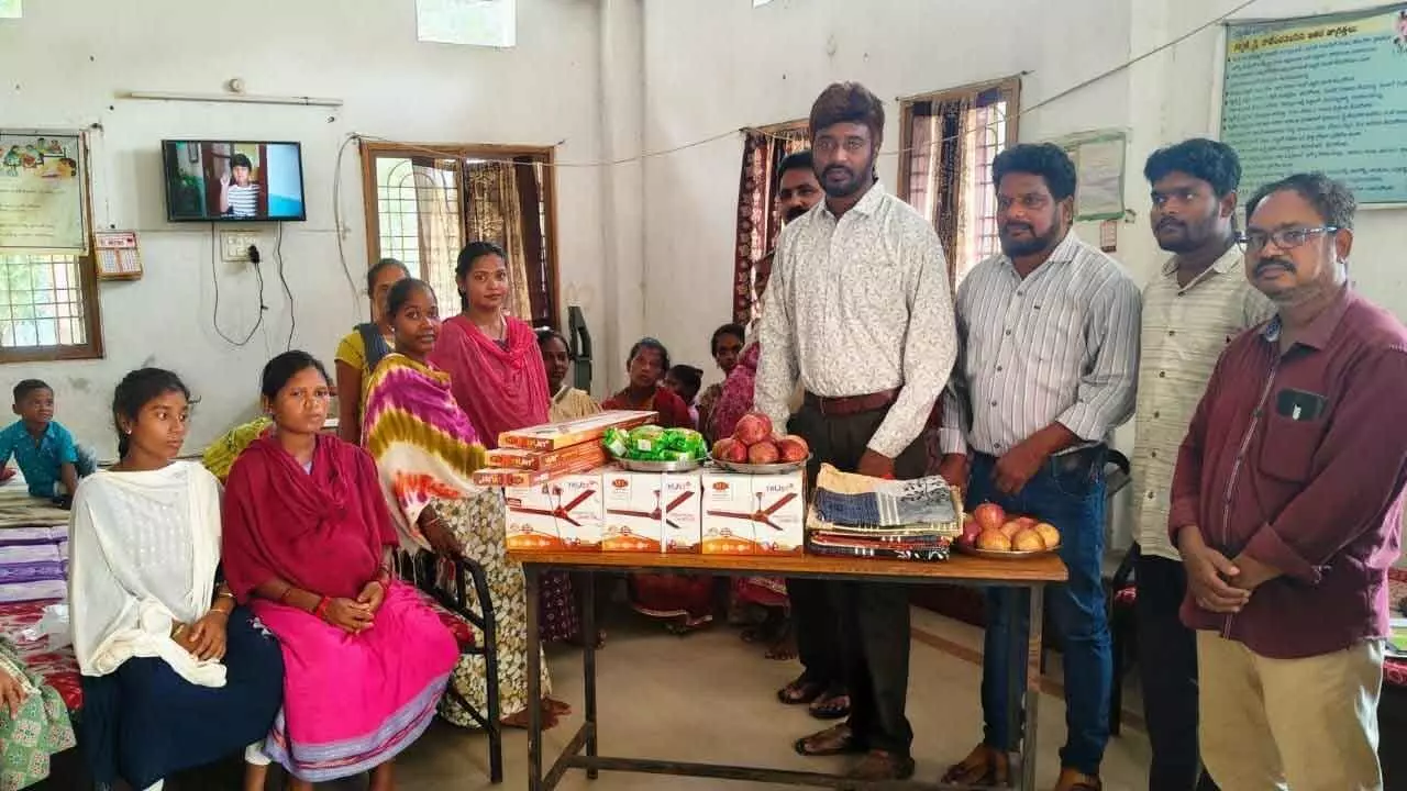 Dr TJagan Mohan Rao distributing nutritious food and fans at prenenent women’s hostel at Salur on Tuesday