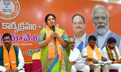 MP and BJP state president D Purandeswari, state in-charge Siddharthnath Singh and other leaders at a meeting on party membership drive in Vijayawada on Friday  Photo Ch Venkata Mastan