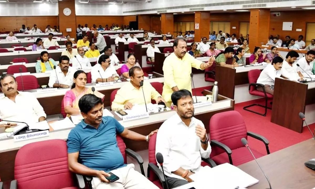 TDP floor leader P Srinivasa Rao briefing their ward issues during the council meeting in Visakhapatnam