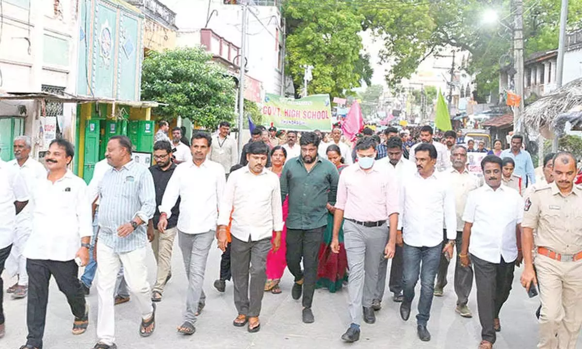 Tirupati district Joint Collector Shubham Bansal, tourism department officials and others taking part in the heritage walk in Chandragiri on Friday evening