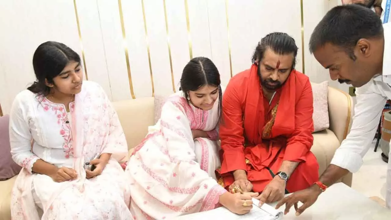 Pawan Kalyan younger daughter signed declaration in Tirumala