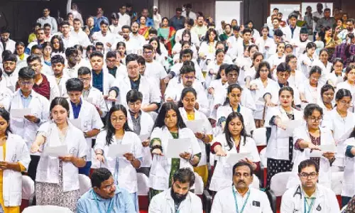 The newly-admitted MBBS students of GIMSR taking oath at the white coat ceremony held in Visakhapatnam on Tuesday