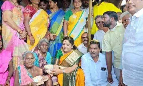 Minister G Sandhya Rani distributing pensions at Salur on Tuesday