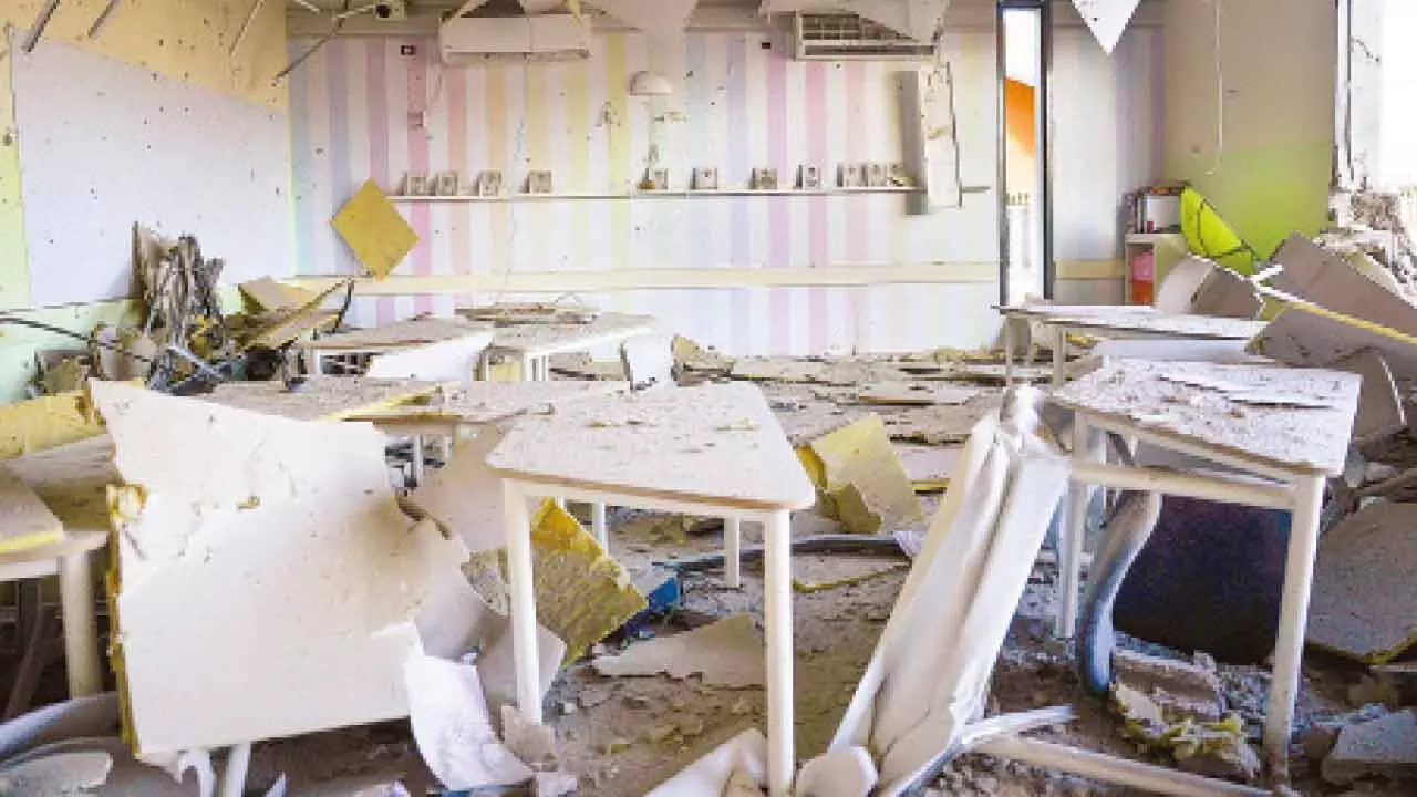 A damaged school building is seen after it was hit in Irans  missile attack in Gedera, Israel, on Wednesday