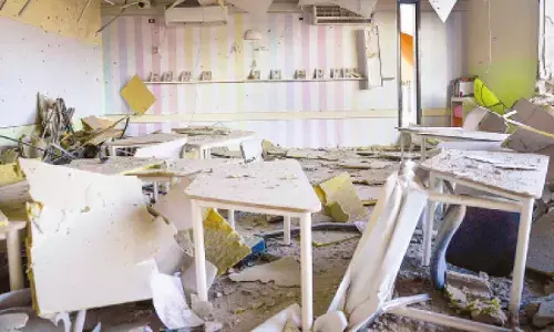 A damaged school building is seen after it was hit in Irans  missile attack in Gedera, Israel, on Wednesday