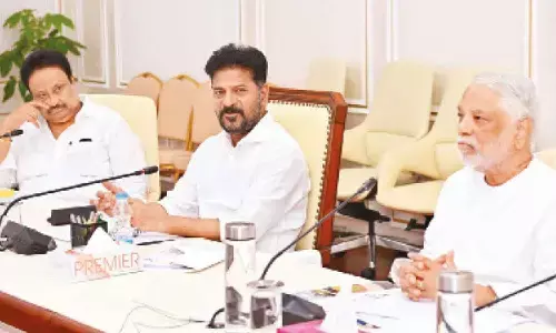 Chief Minister A Revanth Reddy discussing proposals for a sports policy along with Sports Adviser Jitender Reddy and Government Adviser K Keshava Rao, in Hyderabad on Friday