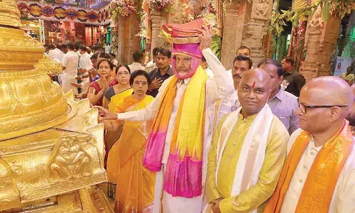 CM Chandrababu Naidu presents silk robes to deity