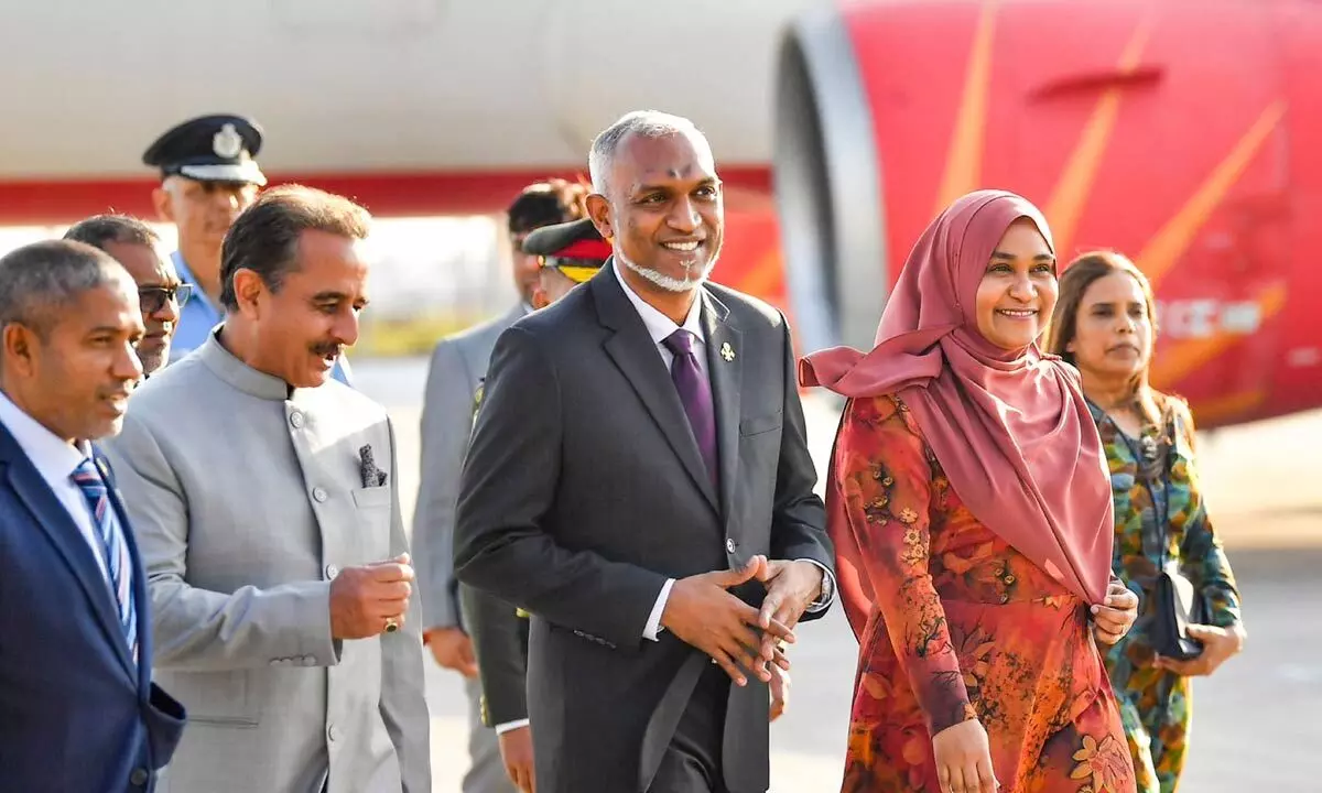 Maldives President Mohamed Muizzu with his wife Sajidha Mohamed on his arrival, in New Delhi