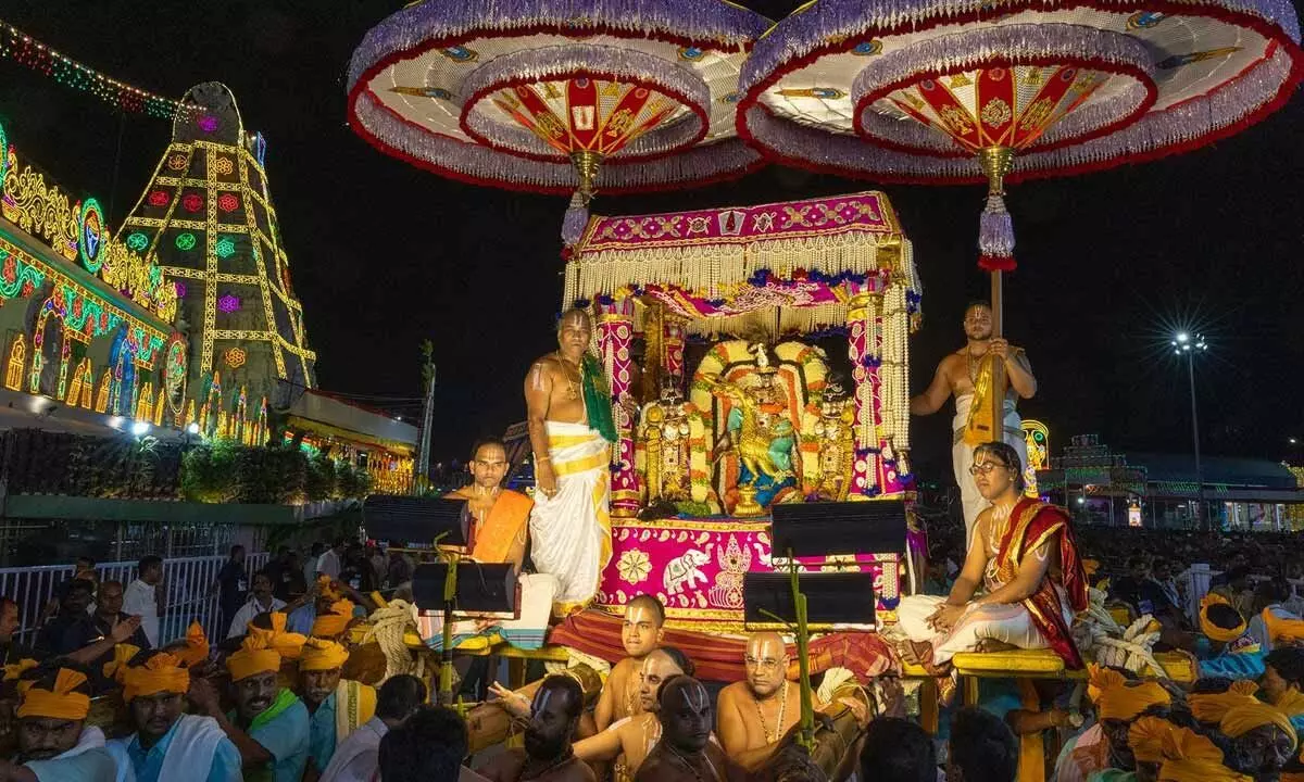 Lord Malayappa being taken out in a procession on Mutyapu Pandiri Vahanam at Tirumala on Sunday evening