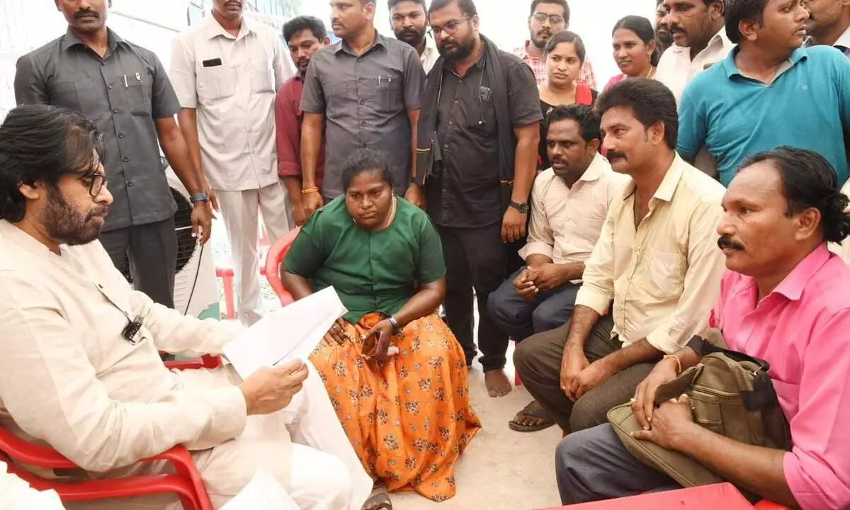 Deputy Chief Minister Pawan Kalyan hearing to the woes of contract employees at his camp office in Mangalagiri on Sunday