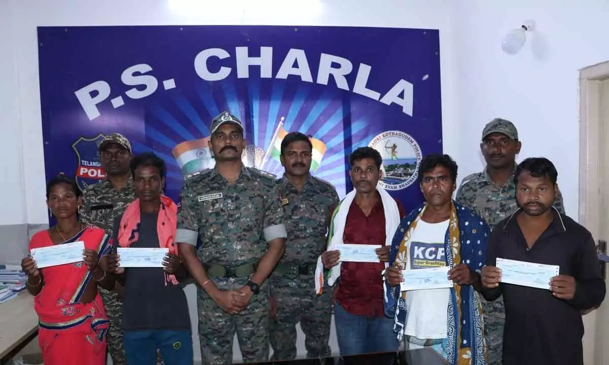 District SP Rohith Raju Hands Over Reward Cheques to Surrendered Maoists