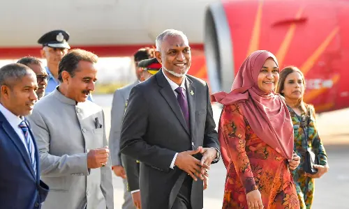 Maldives President Mohamed Muizzu with his wife Sajidha Mohamed on his arrival, in New Delhi