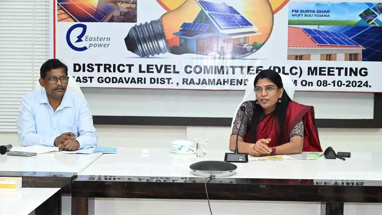 Collector P Prasanthi and SE, APEPDCL Tilak Kumar speaking at the first district-level committee meeting on Muft Bijli Yojana in Rajamahendravaram on Tuesday