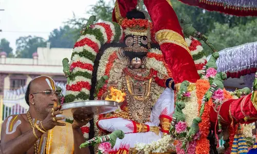 Fervour, gaiety mark Garuda Vahana Seva