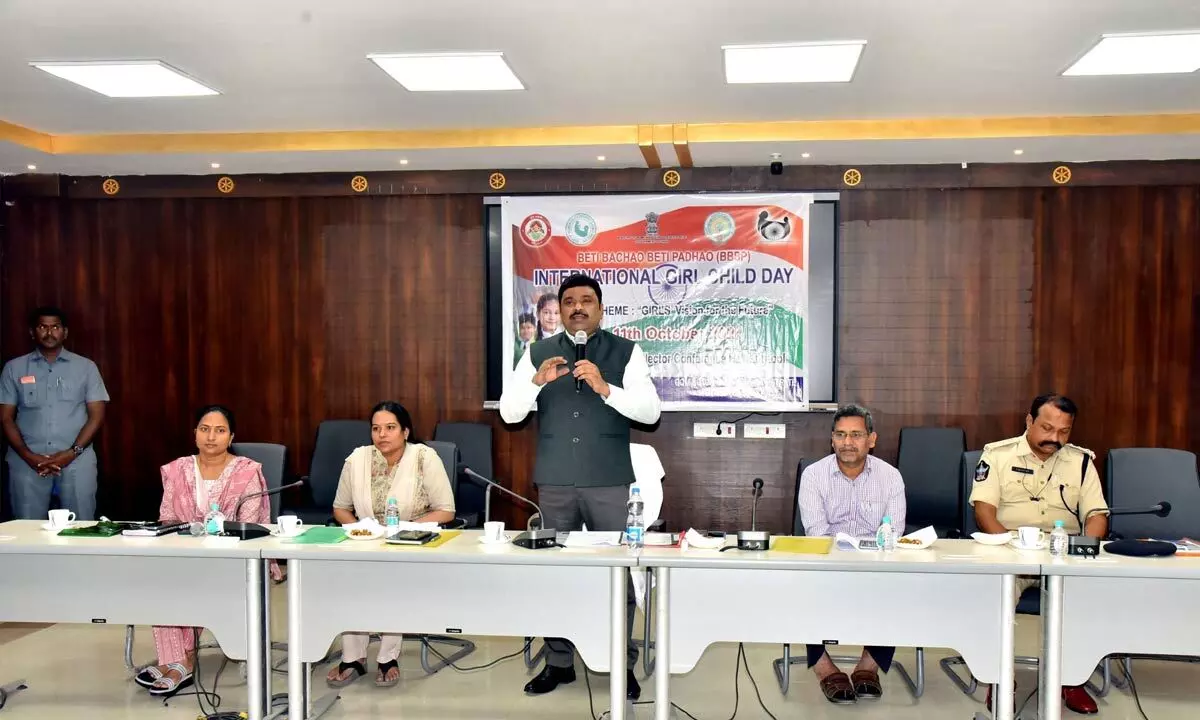 District Collector P Ranjit Basha speaking at a programme on International Day of the Girl Child at the Collector conference hall in Kurnool on Friday