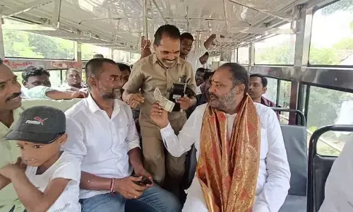 Peddapalli MLA Chinthakunta Vijayaramana Rao travelling in the new bus service from Jammikunta to Karimnagar on Thursday