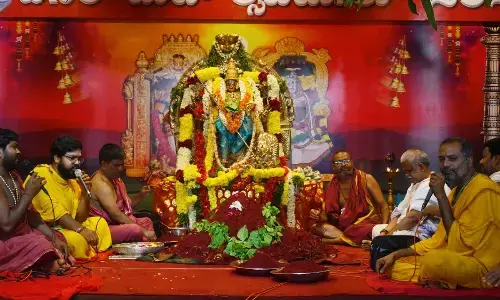 Kumkuma puja being performed to Goddess Mahishasura Mardini on Indrakeeladri in Vijayawada on Friday