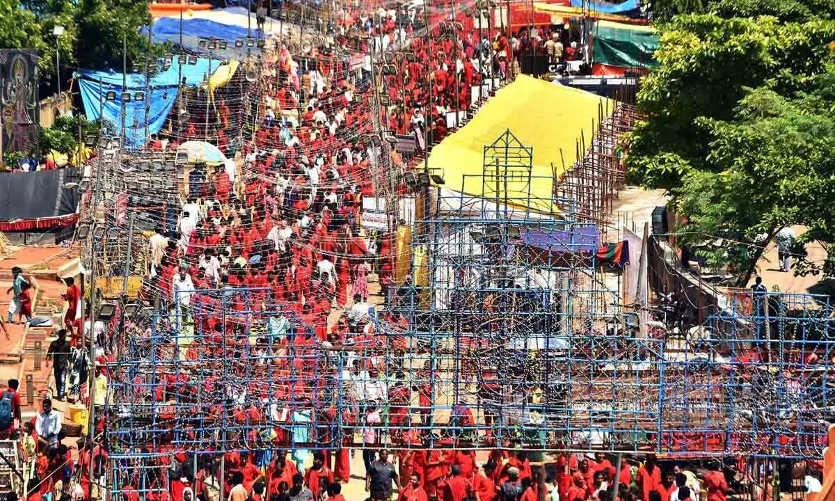 A huge rush of Bhavani devotees at Durga temple in Vijayawada on Sunday. Photo Ch Venkata Mastan .