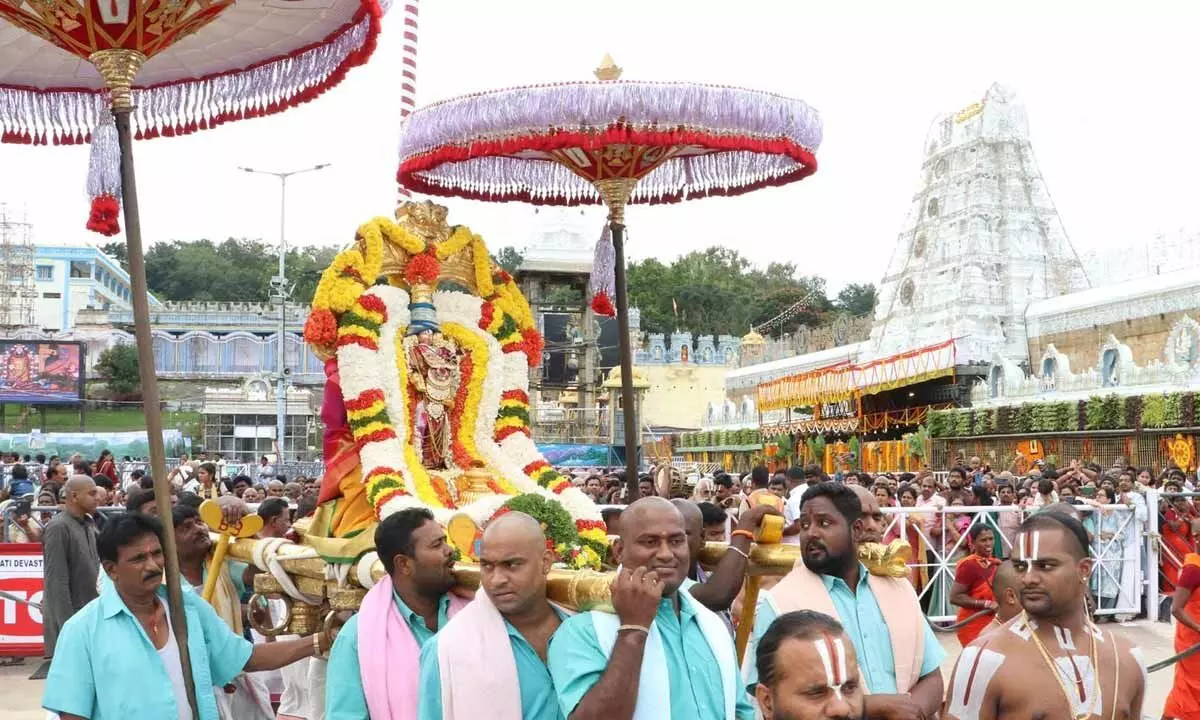 Processional deities of Sri Malayappa Swamy and His two Consorts, Sridevi and Bhudevi being taken out on a procession in Tirumala on Sunday