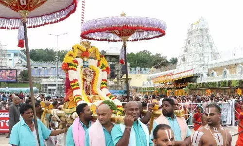 Processional deities of Sri Malayappa Swamy and His two Consorts, Sridevi and Bhudevi being taken out on a procession in Tirumala on Sunday