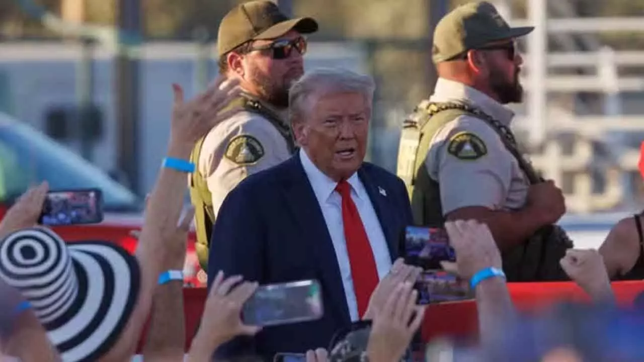 Man with shotgun held near Trumps rally