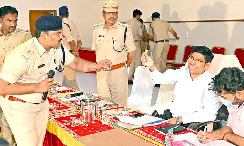 Liquor shops lottery process held peacefully in Tirupati