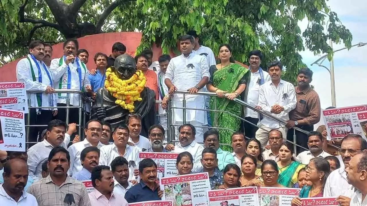 YSRCP leaders staging a dharna in Visakhapatnam on Tuesday