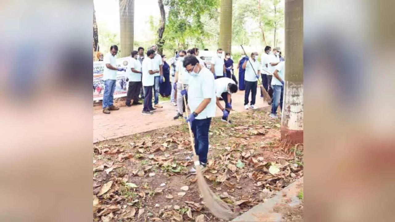 DRM Saurabh Prasad participating in a cleanliness programme organised in Visakhapatnam on Tuesday