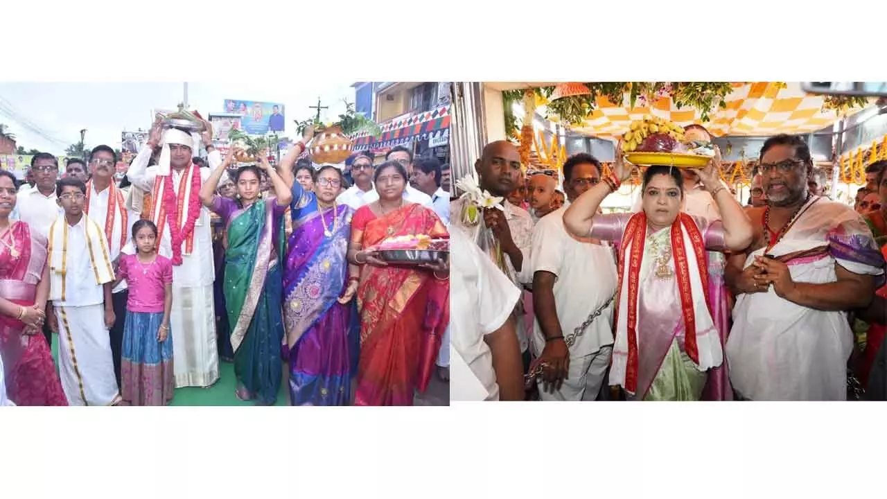 Ministers Kondapalli Srinivas, G Sandhya Rani (beside) offering silk robes to Goddess on Tuesday