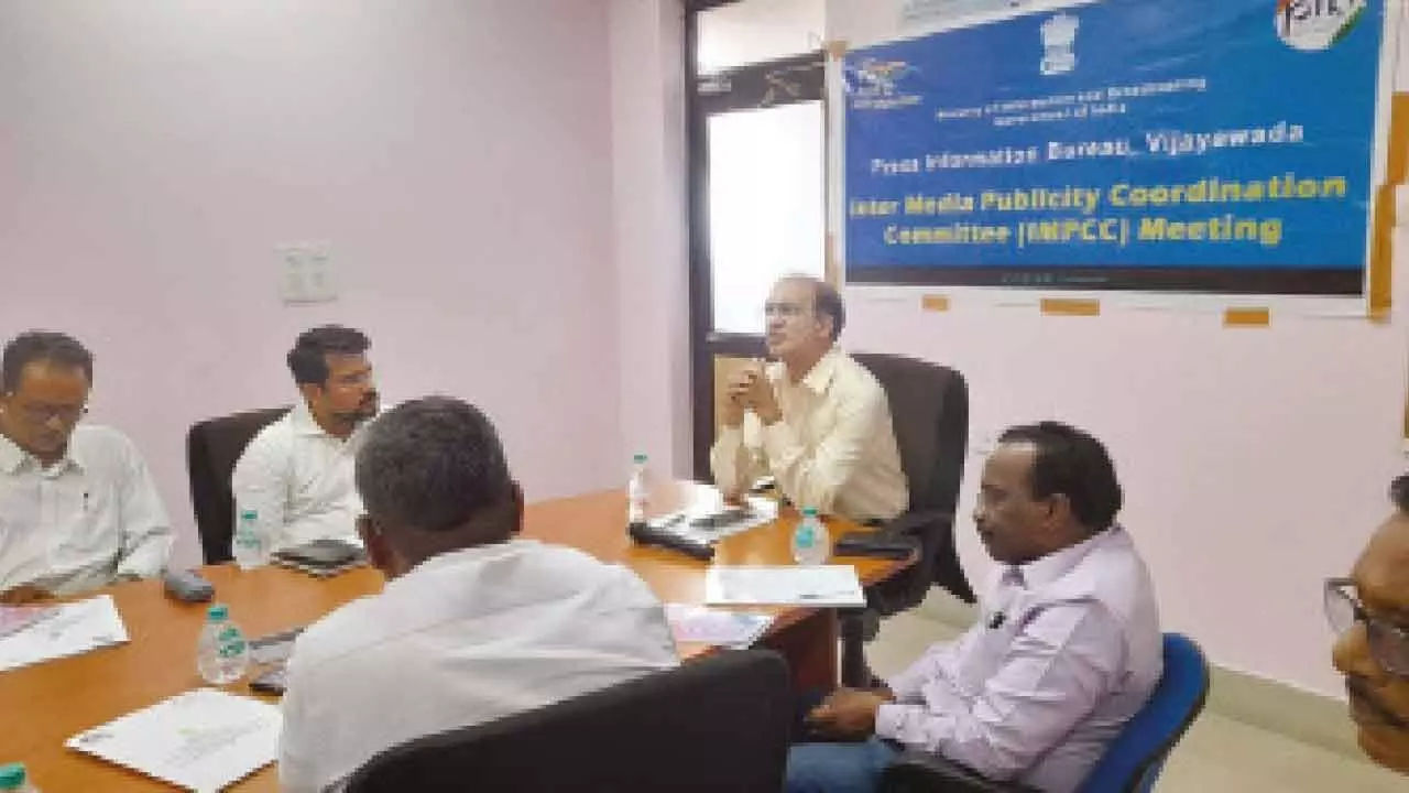 Additional director general of PIB Rajinder Chaudhry addressing IMPCC meeting in Vijayawada on Thursday