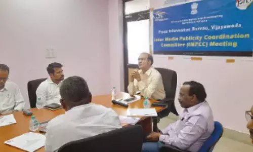 Additional director general of PIB Rajinder Chaudhry addressing IMPCC meeting in Vijayawada on Thursday