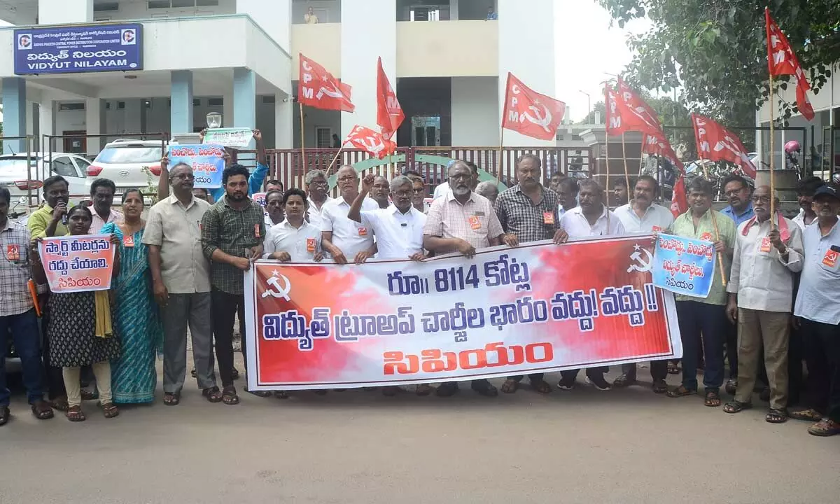 CPM state executive member Ch BabuRao, party leaders and activists staging a protest against the proposed true-up charges on power consumers in Vijayawada on Friday Photo Ch Venkata Mastan