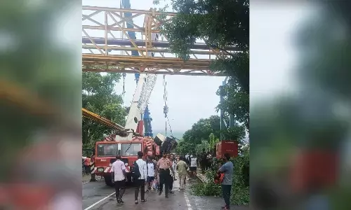 Rescue operation launched to remove the overturned crane in Visakhapatnam
