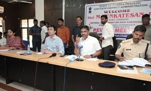 M Venkatesan, chairman of National Safai Karmachari Commission, speaking at a review meeting in Chittoor on Friday.  District Collector Sumit Kumar, SP Manikanta Chandolu and Joint Collector G Vidyadhari are also seen.