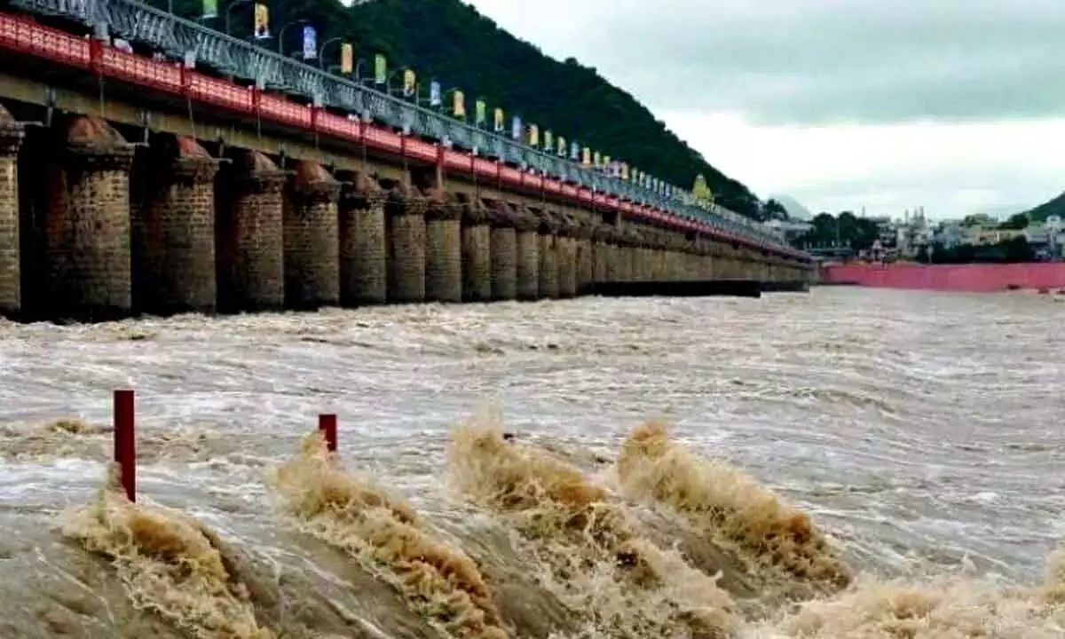 70 gates of Prakasam Barrage lifted to leave water amid increase in inflow