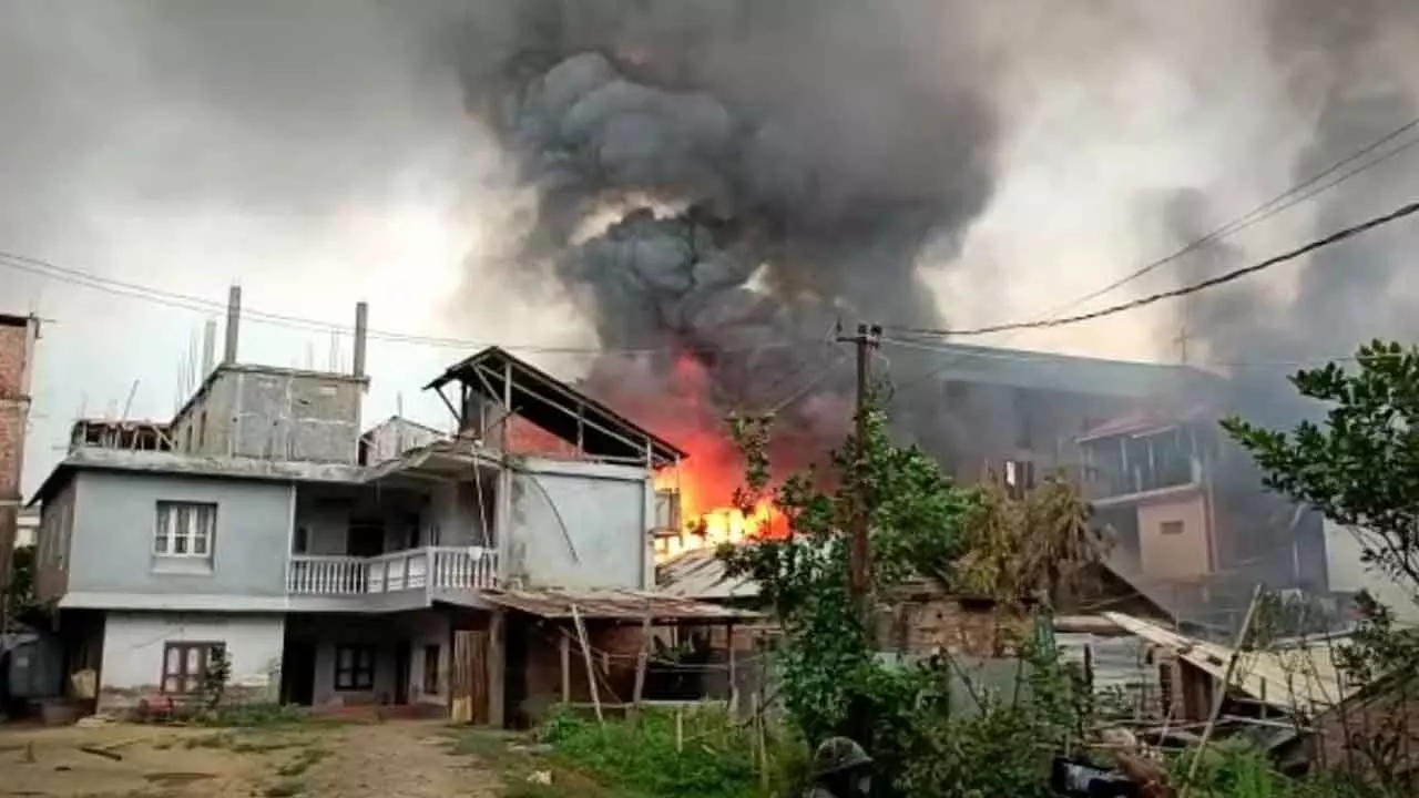 Two abandoned farm houses set afire by suspected militants in Manipur