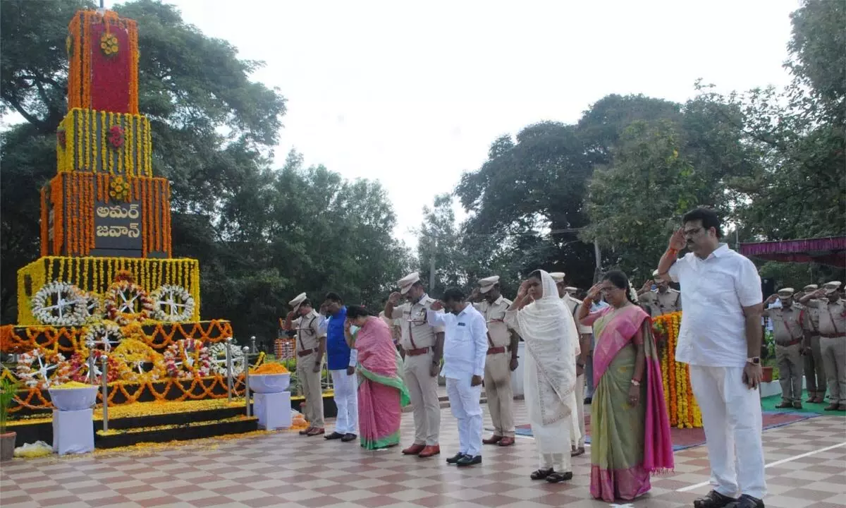 Minister DSBV Swamy, SP AR Damodar, Collector A Thameem Ansariya, 20 PPIC Chairman Lanka Dinakar and others paying tributes to police matryrs at Police Parade Grounds in Ongole on MondayPhoto: Ajay Babu Gera