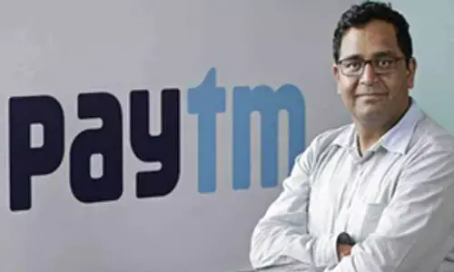 Paytm reports Rs 930 crore net profit after one-time gain, stock down over 4 pc