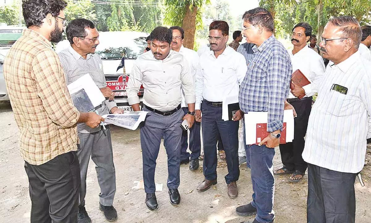 GVMC Commissioner P Sampath Kumar instructing the officials during his field visit to Anakapalli on Tuesday