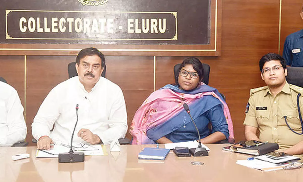 Minister Nadendla Manohar along with Minister K Parthasarathy, Collector K Vetri Selvi and others holding a review meeting in Eluru on Tuesday