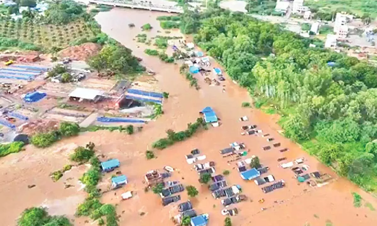 A locality submerged by overflowing Pandameru stream on the outskirts of Anantapur city