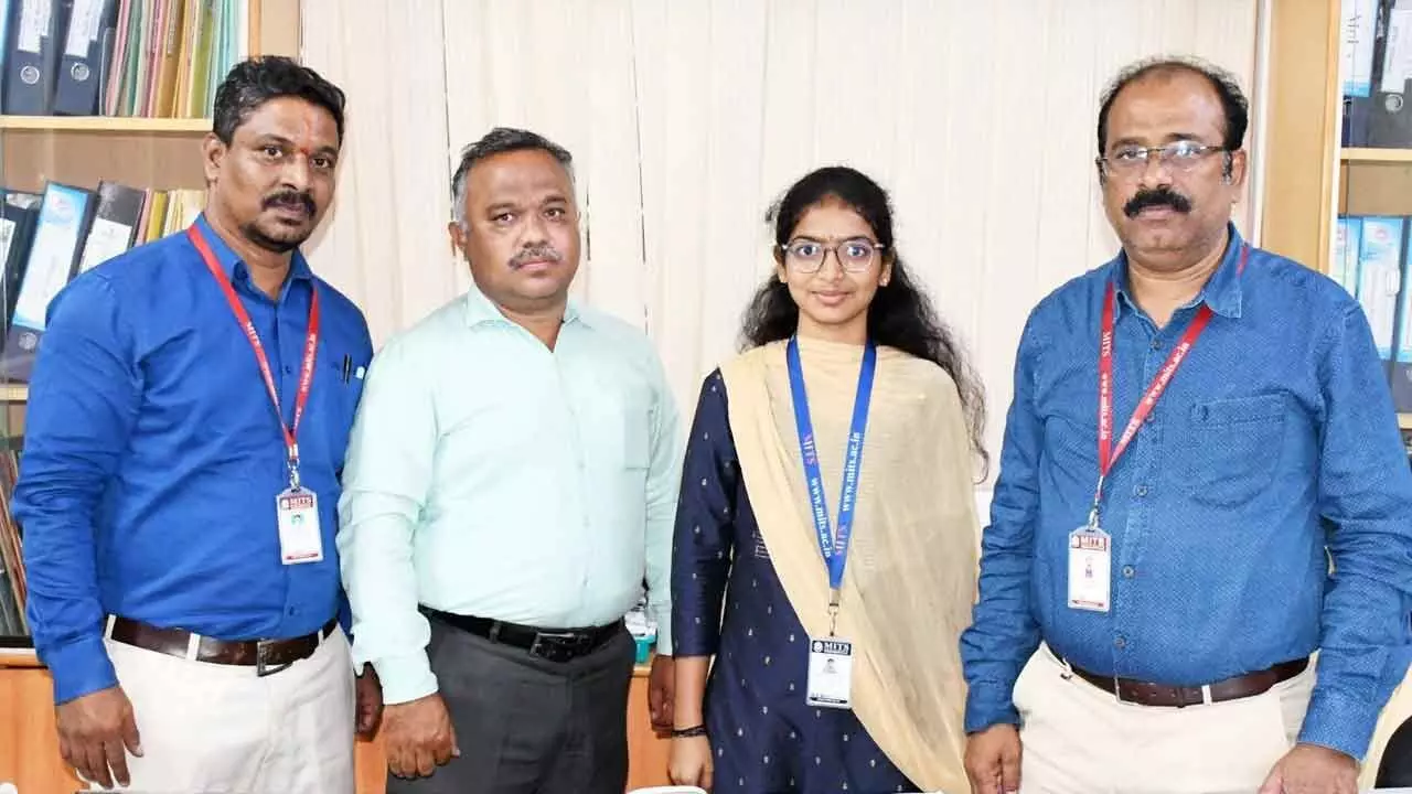 MITS student M Nageswari with college officials in Madanapalle