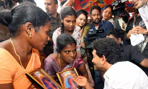 YSRCP president Y S Jagan Mohan Reddy speaks to the families of those died of diarrhoea at Gurla in Vizianagaram district on Thursday