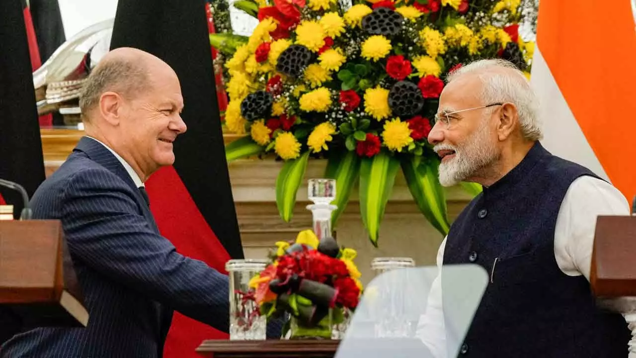 Prime Minister Narendra Modi and German Chancellor Olaf Scholz during a press meet after their delegation level talks, at the Hyderabad House, in New Delhi on Friday