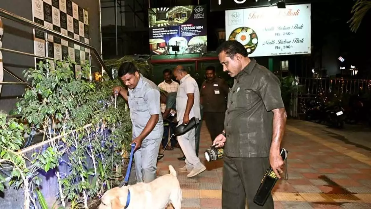 Police conduct thorough inspections at a hotel following bomb threat in Tirupati