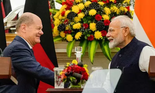 Prime Minister Narendra Modi and German Chancellor Olaf Scholz during a press meet after their delegation level talks, at the Hyderabad House, in New Delhi on Friday